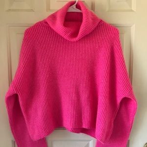 A cute bright pink sweater, crop top